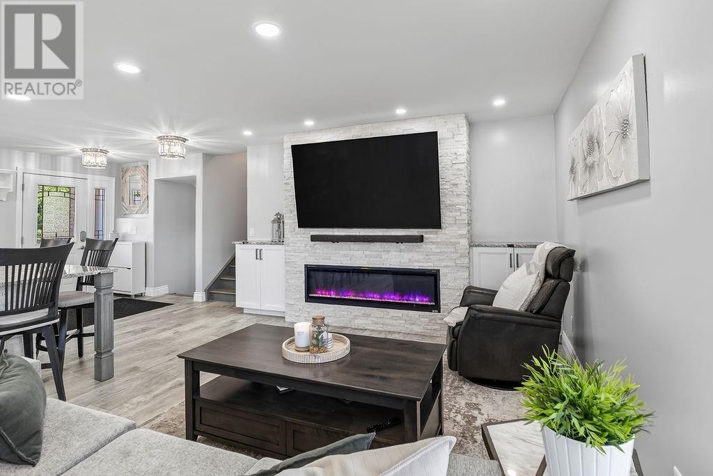 2815 Main Street, Blezard Valley, ON - Indoor Photo Showing Living Room With Fireplace