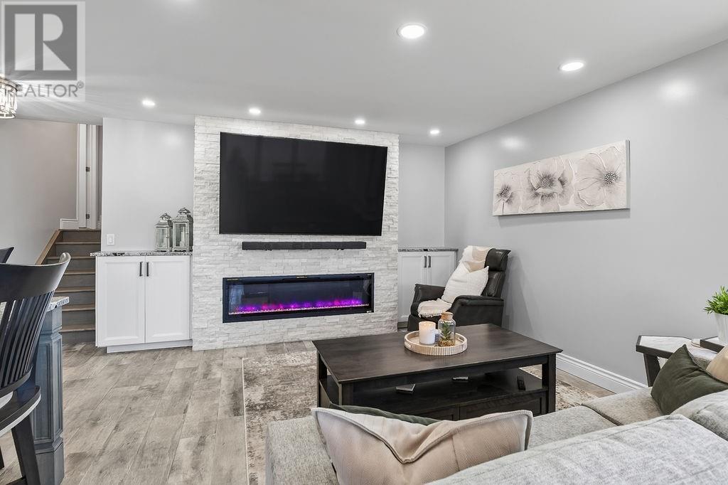2815 Main Street, Blezard Valley, ON - Indoor Photo Showing Living Room With Fireplace