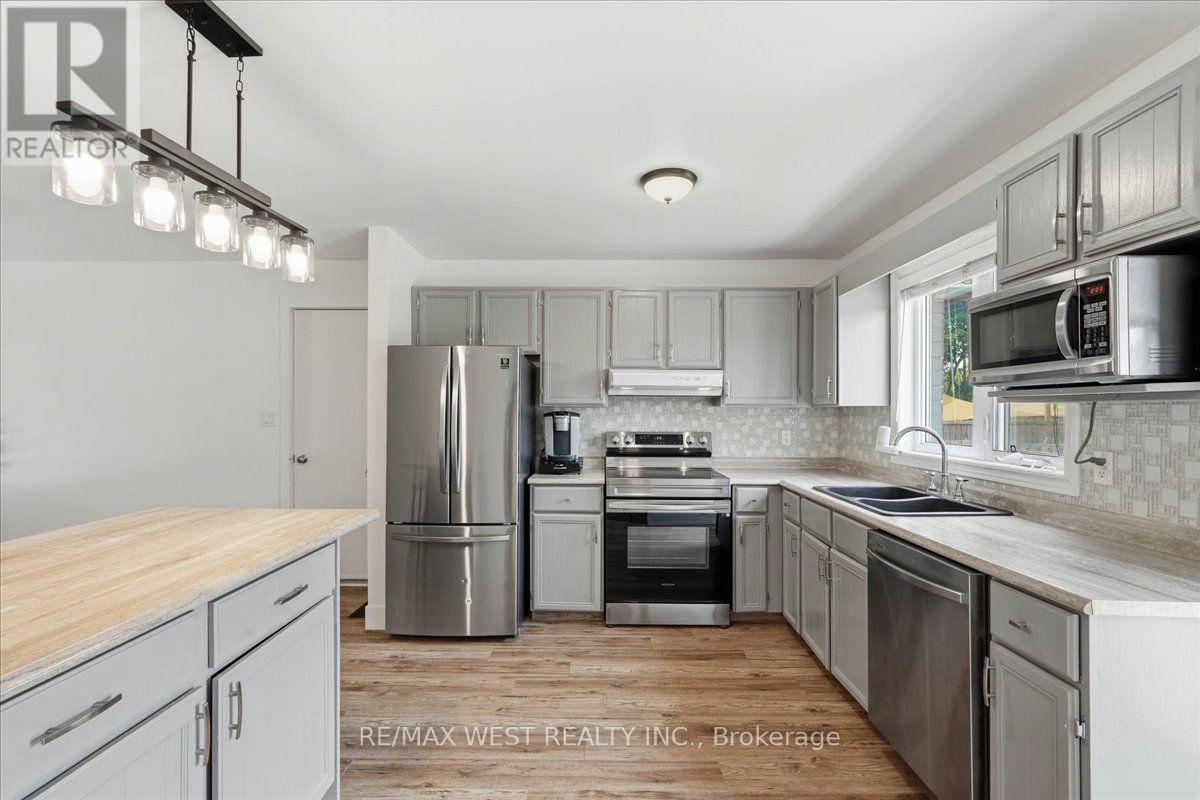 12 Dunnett Drive, Brighton, ON - Indoor Photo Showing Kitchen With Double Sink