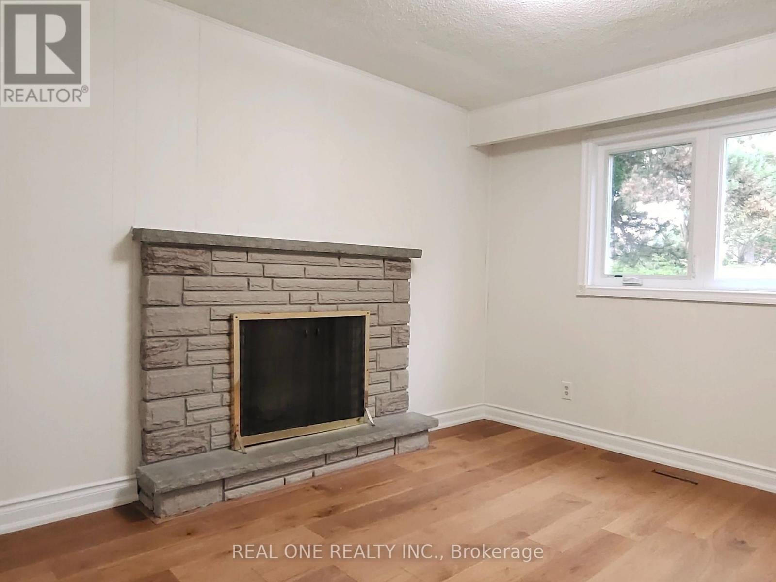 13 Mallaby Road, Toronto, ON - Indoor With Fireplace
