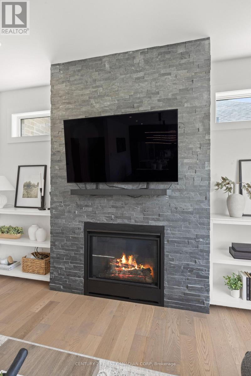 10 Beaty Lane, Zorra (Thamesford), ON - Indoor Photo Showing Living Room With Fireplace