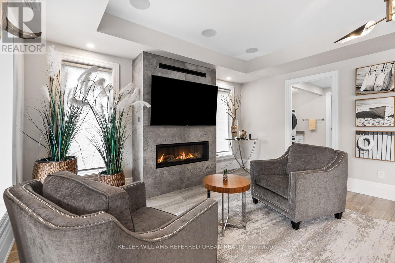 61 Ria Court, King, ON - Indoor Photo Showing Living Room With Fireplace
