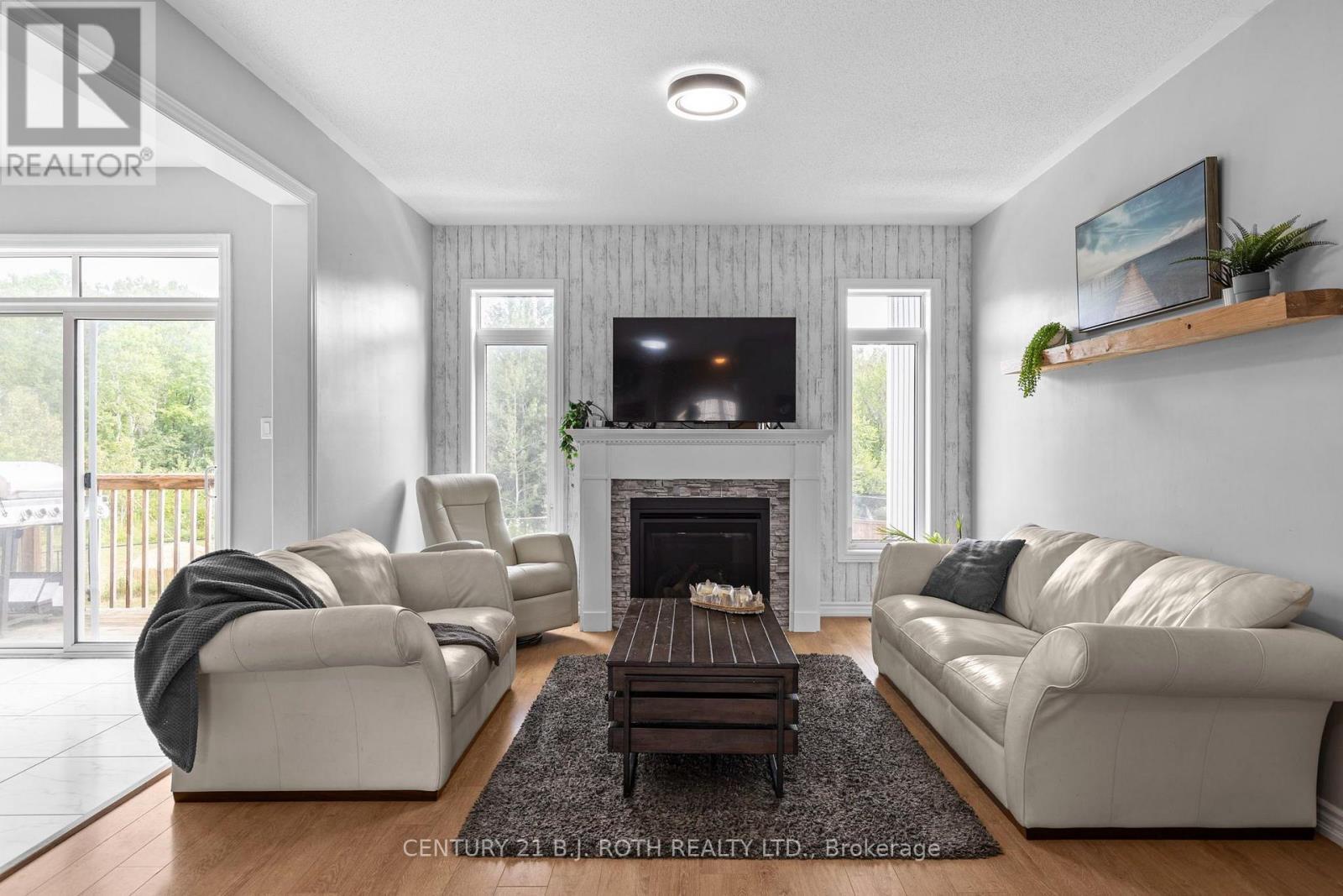 211 Roy Drive, Clearview, ON - Indoor Photo Showing Living Room With Fireplace