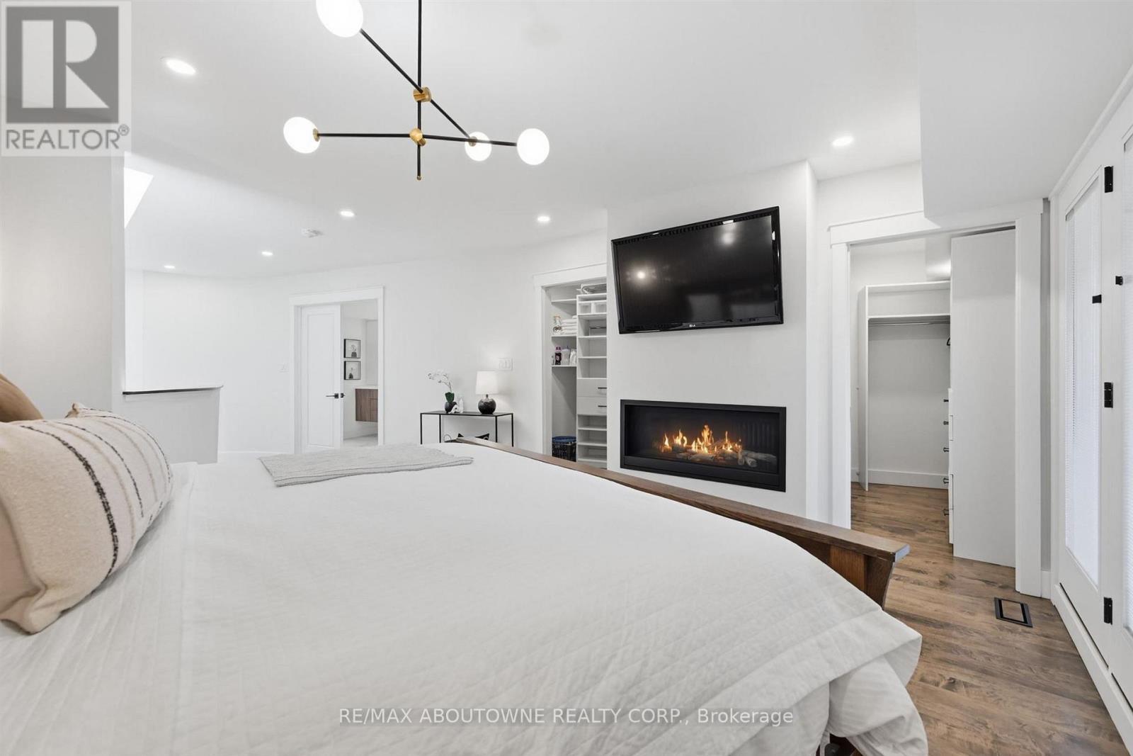 25 Southwind Terrace, Oakville, ON - Indoor Photo Showing Bedroom With Fireplace