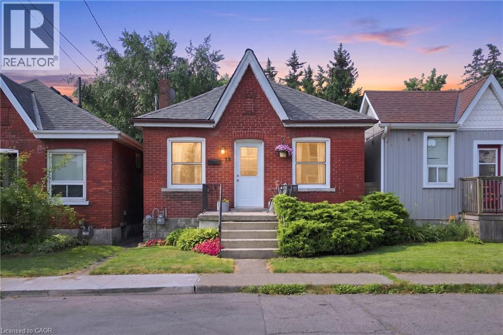 Red brick facade with a prominent gabled entrance - 58 Edinburgh Avenue, Hamilton, ON - Outdoor