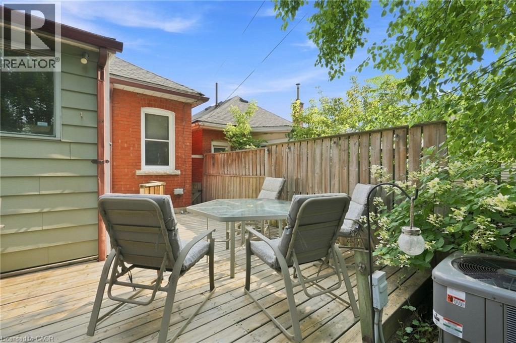 Spacious wood deck featuring ample room for outdoor dining - 58 Edinburgh Avenue, Hamilton, ON - Outdoor With Deck Patio Veranda