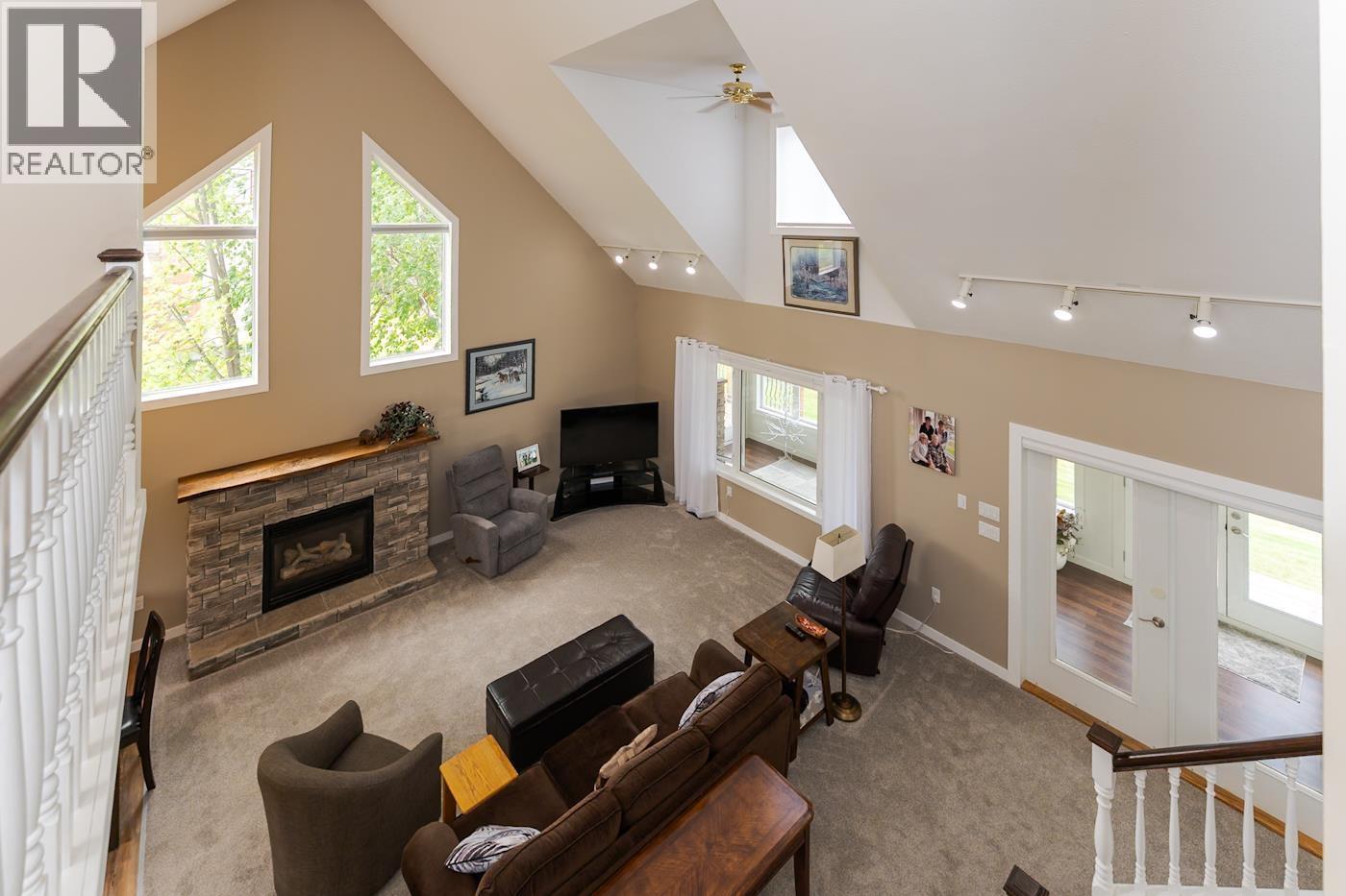 1165 Adams Road, Prince George, BC - Indoor Photo Showing Other Room With Fireplace