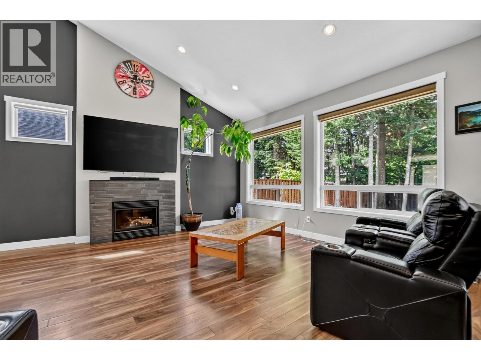7557 Loedel Crescent, Prince George, BC - Indoor Photo Showing Living Room With Fireplace