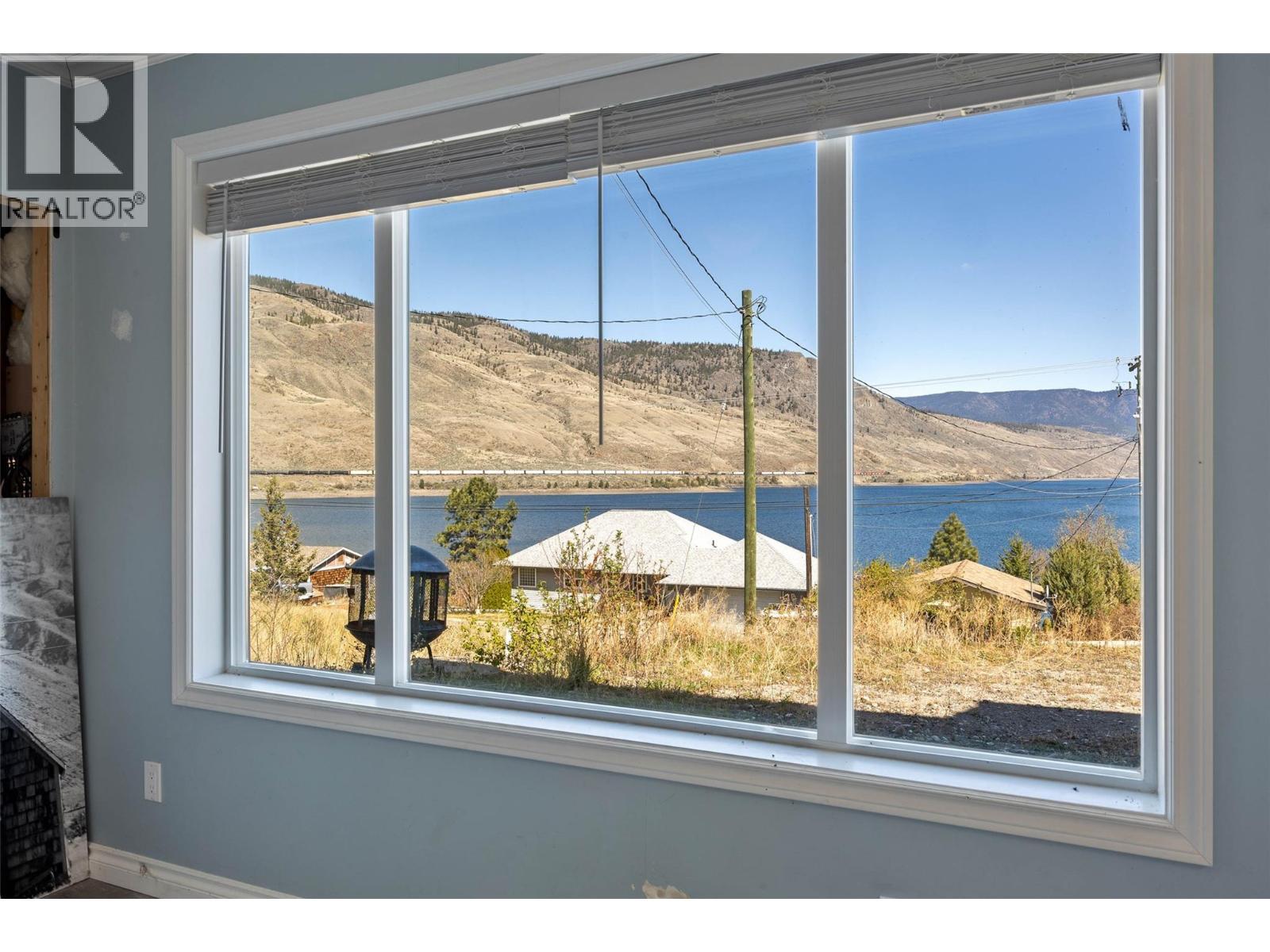 6216 Savona Access Road, Kamloops, BC - Indoor Photo Showing Other Room With Body Of Water