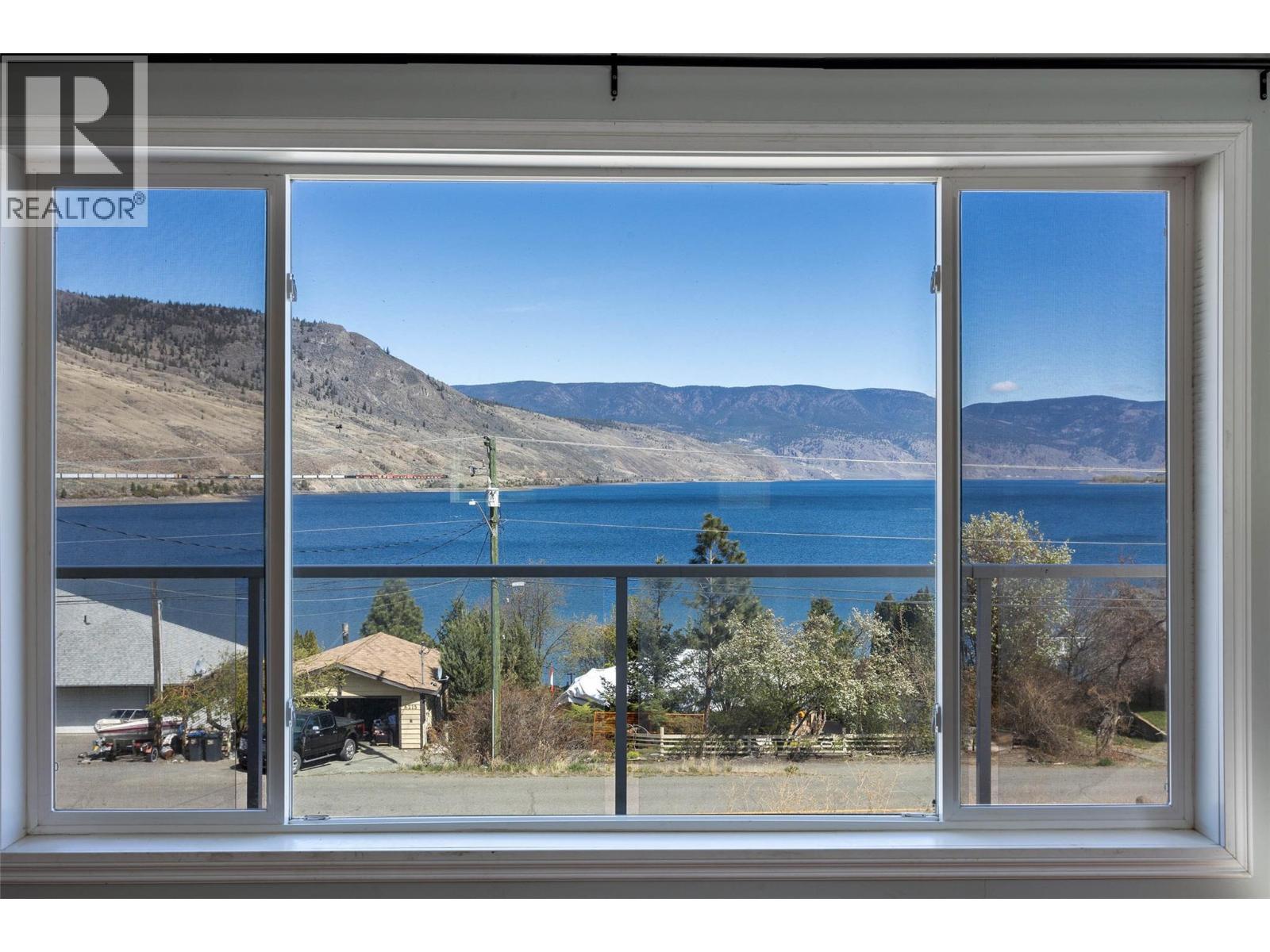 6216 Savona Access Road, Kamloops, BC - Indoor Photo Showing Other Room With Body Of Water
