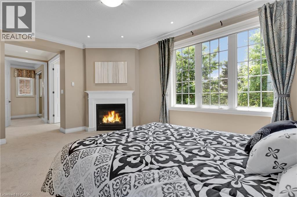 170 Garth Massey Drive, Cambridge, ON - Indoor Photo Showing Bedroom With Fireplace