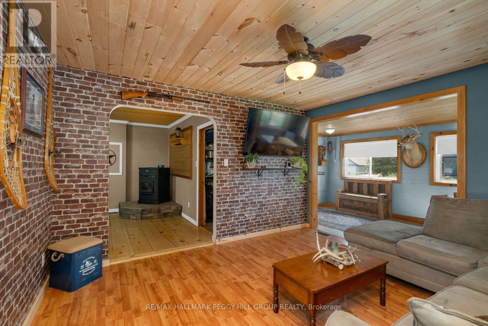 598321 2Nd Line W, Mulmur, ON - Indoor Photo Showing Living Room With Fireplace