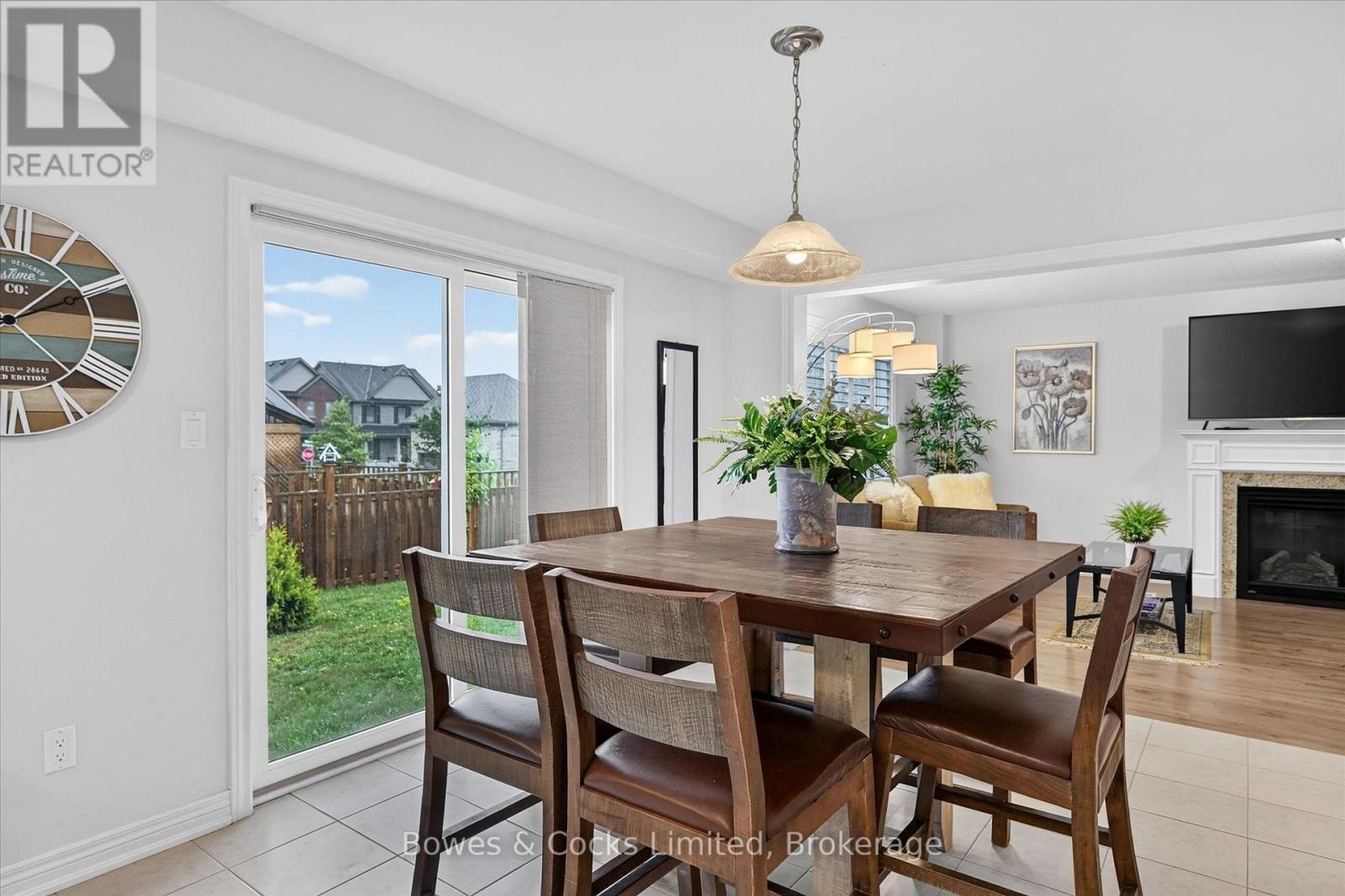 534 Grange Way, Peterborough (Northcrest Ward 5), ON - Indoor Photo Showing Dining Room With Fireplace