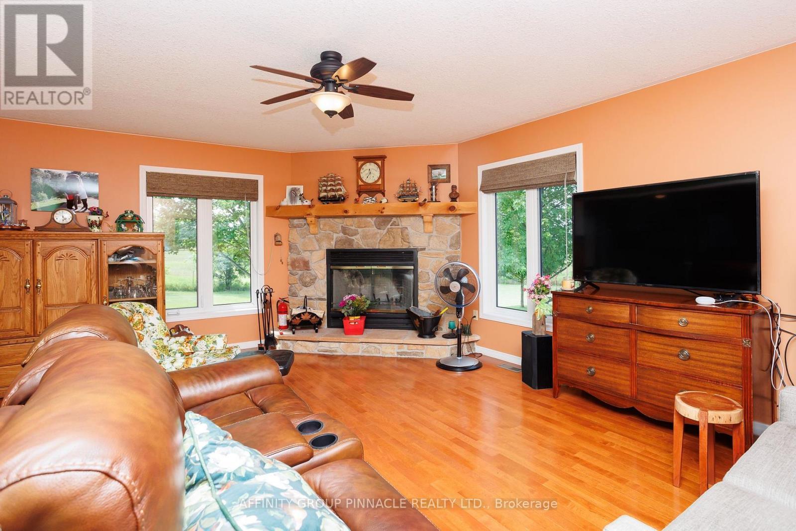 243 Fairbairn Road, Kawartha Lakes (Bobcaygeon), ON - Indoor Photo Showing Living Room With Fireplace