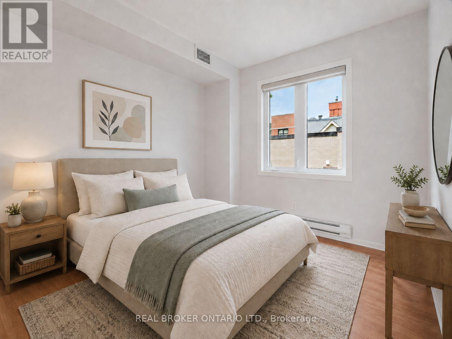Photo Virtually Staged & Enhanced - 10 - 405 Laurier Avenue E, Ottawa, ON - Indoor Photo Showing Bedroom