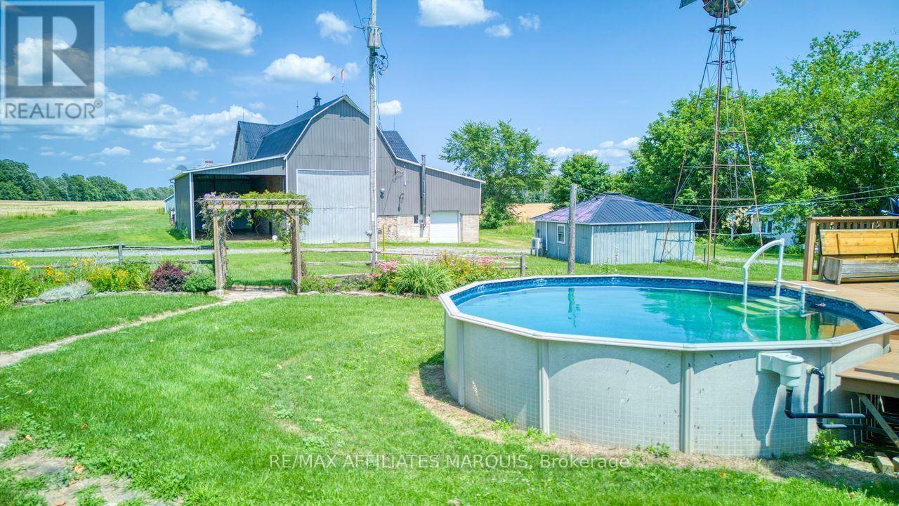 stunning back yard - 421 Summers Road, Rideau Lakes, ON - Outdoor With Above Ground Pool