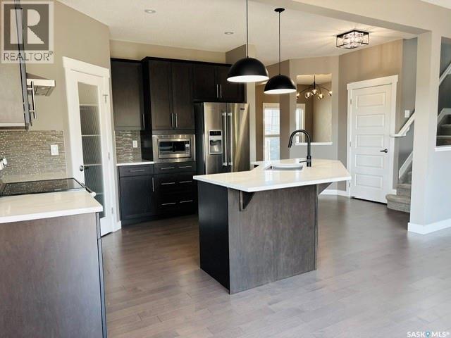 411 Flynn Lane, Saskatoon, SK - Indoor Photo Showing Kitchen With Upgraded Kitchen