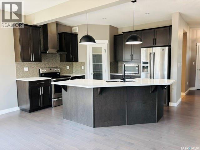 411 Flynn Lane, Saskatoon, SK - Indoor Photo Showing Kitchen With Upgraded Kitchen