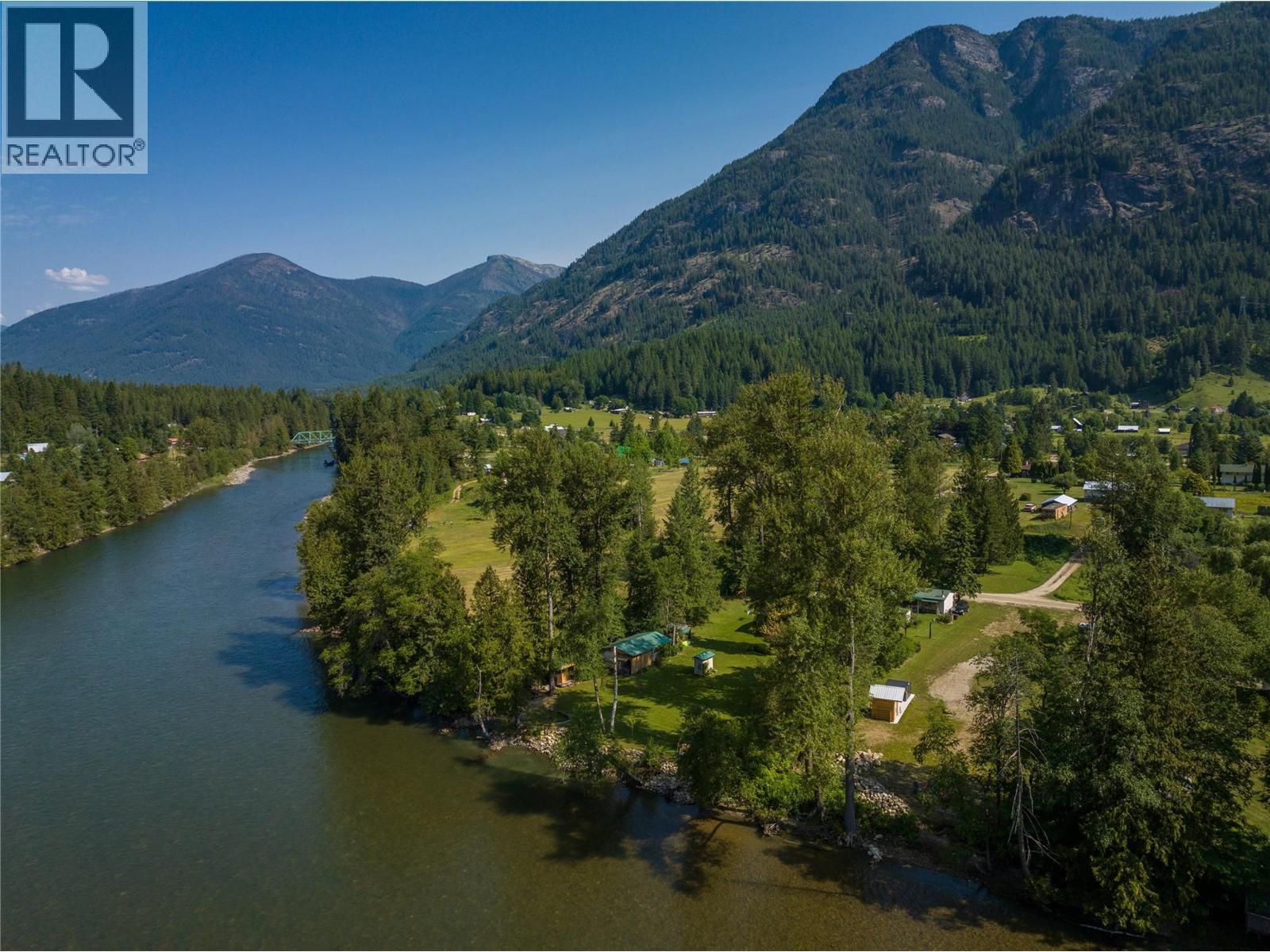 Slocan River looking towards Slocan Park Bridge. - 3045 Bower Road, Slocan Park, BC