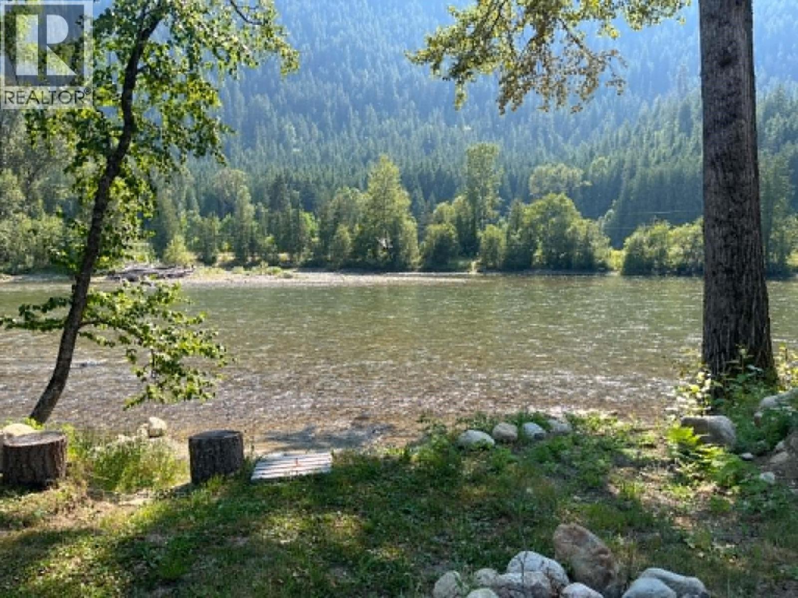 View from the fire pit. - 3045 Bower Road, Slocan Park, BC
