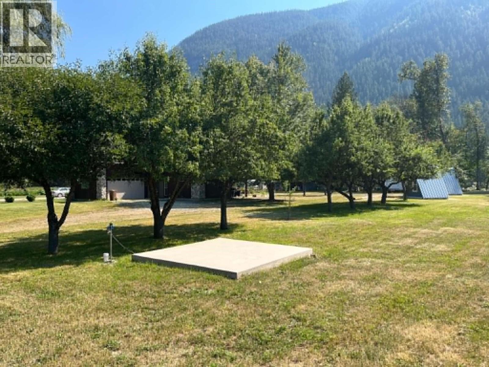Cement pad for eventual electrical power house. Also location of water tap. - 3045 Bower Road, Slocan Park, BC