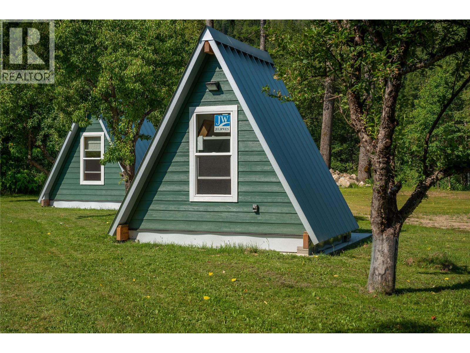 Back view of prefab A-Frames. - 3045 Bower Road, Slocan Park, BC