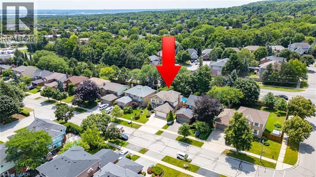 Aerial perspective of a residential neighborhood featuring established homes and mature trees - 2188 Bader Crescent, Burlington, ON - Outdoor With View