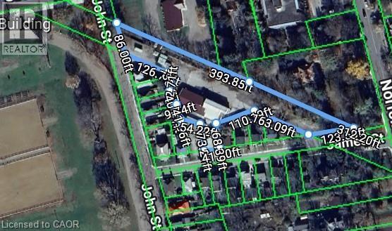 Property Survey. Depicting the boundaries and dimensions of the property - 9 James Street, Simcoe, ON