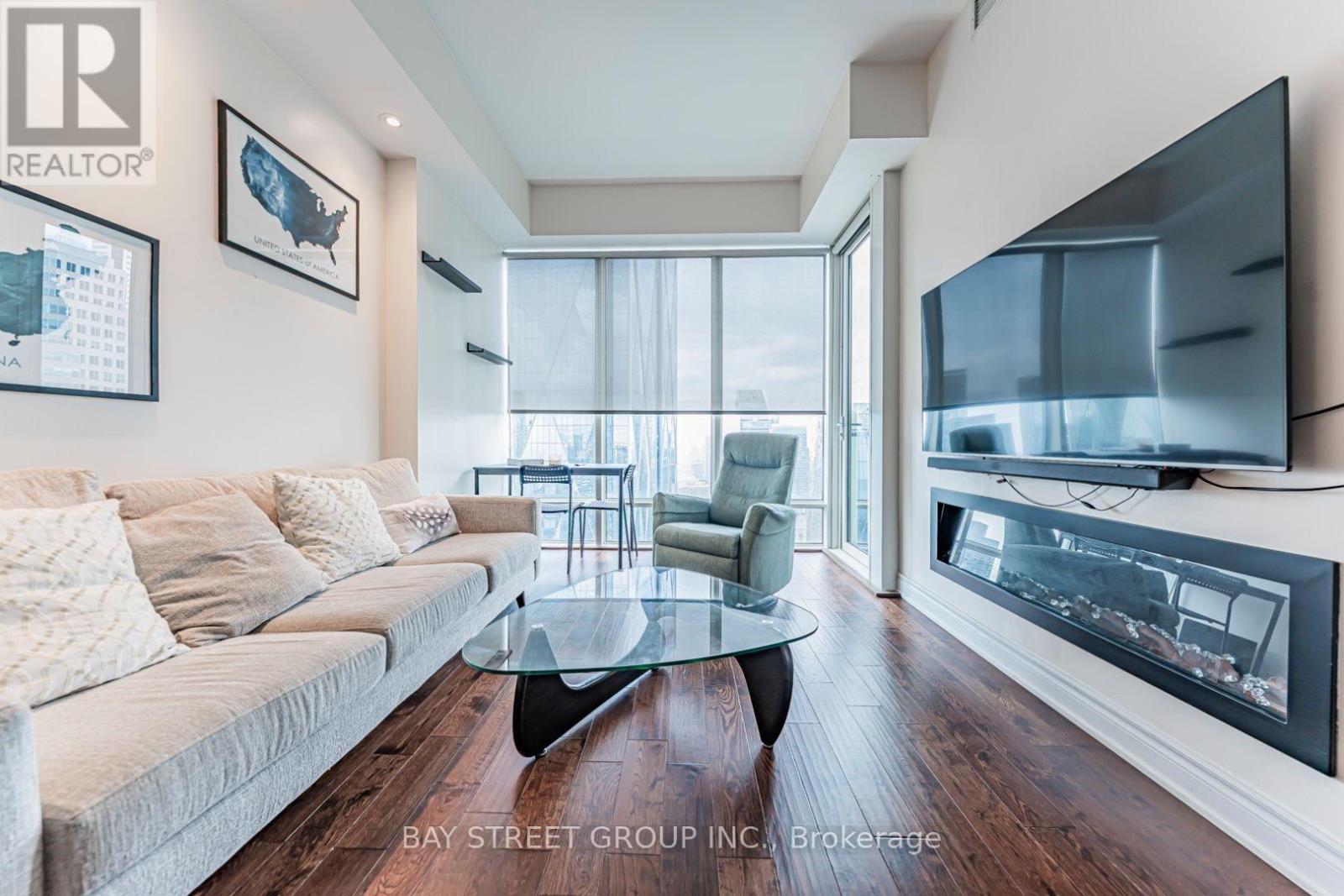 5403 - 8 The Esplanade, Toronto, ON - Indoor Photo Showing Living Room With Fireplace