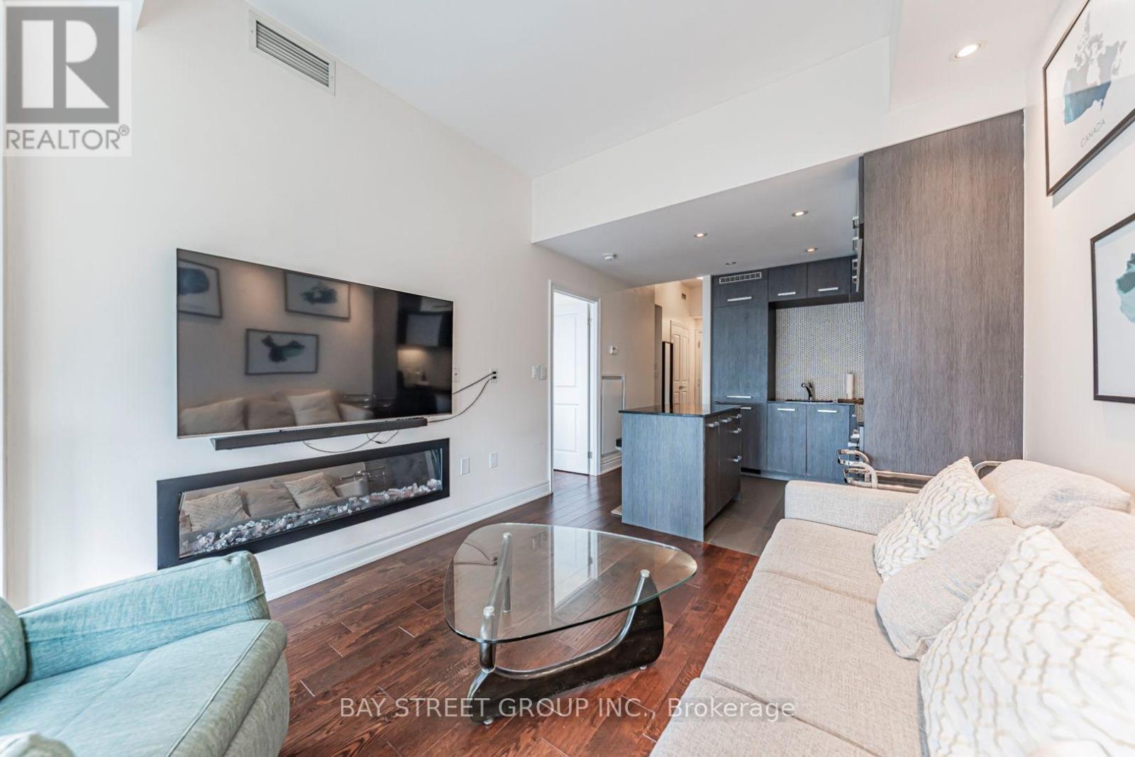 5403 - 8 The Esplanade, Toronto, ON - Indoor Photo Showing Living Room With Fireplace