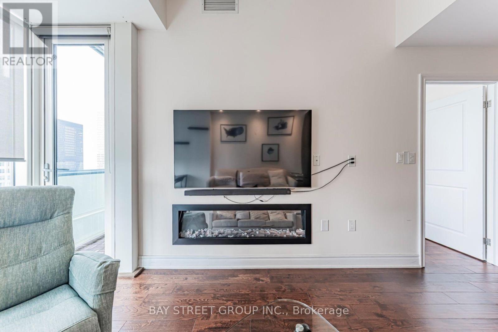 5403 - 8 The Esplanade, Toronto, ON - Indoor Photo Showing Living Room With Fireplace