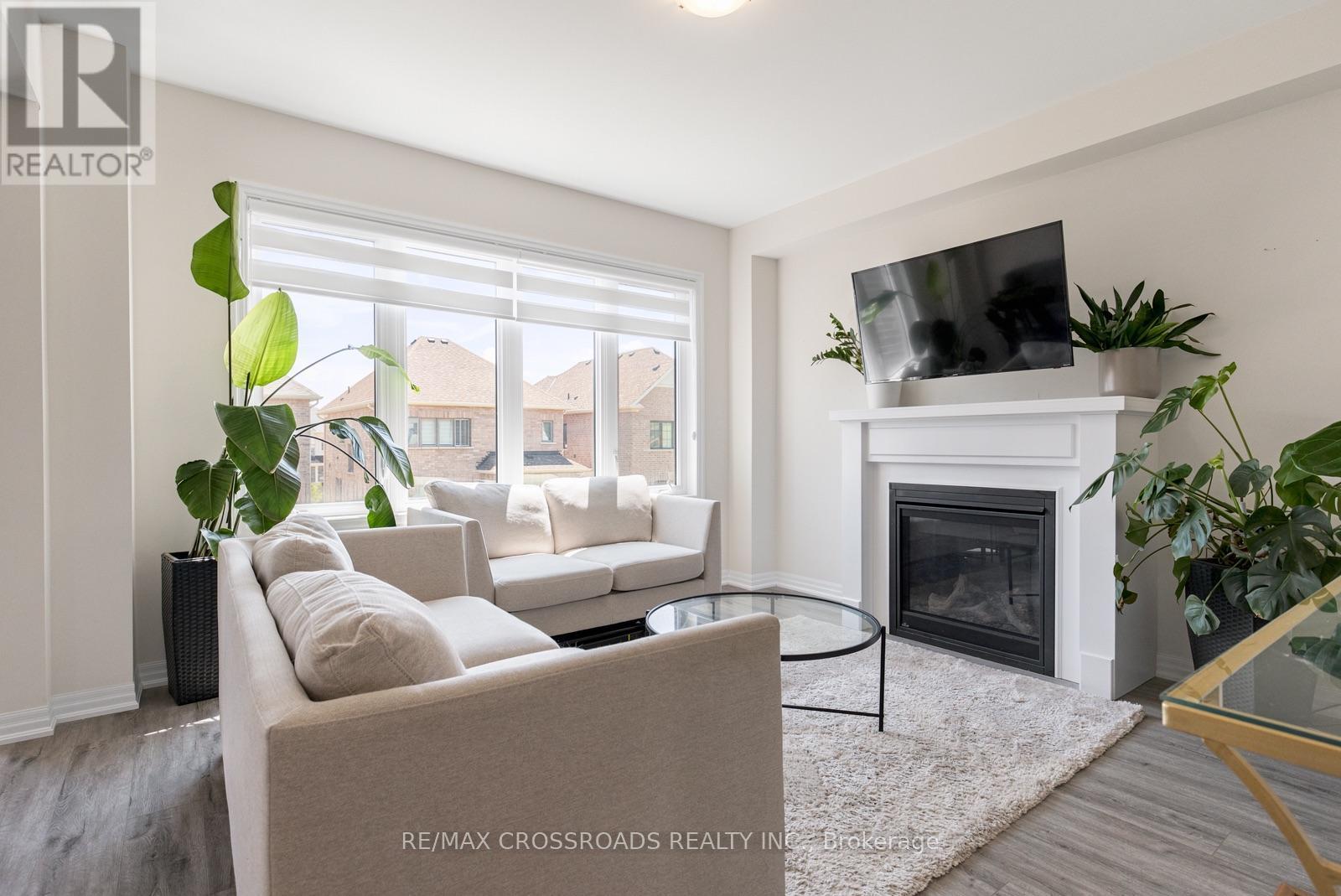 47 Ed Ewert Avenue, Clarington, ON - Indoor Photo Showing Living Room With Fireplace