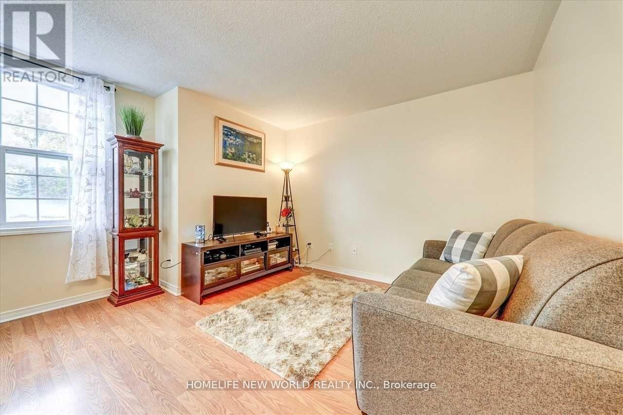 204 - 35 Strangford Lane, Toronto, ON - Indoor Photo Showing Living Room