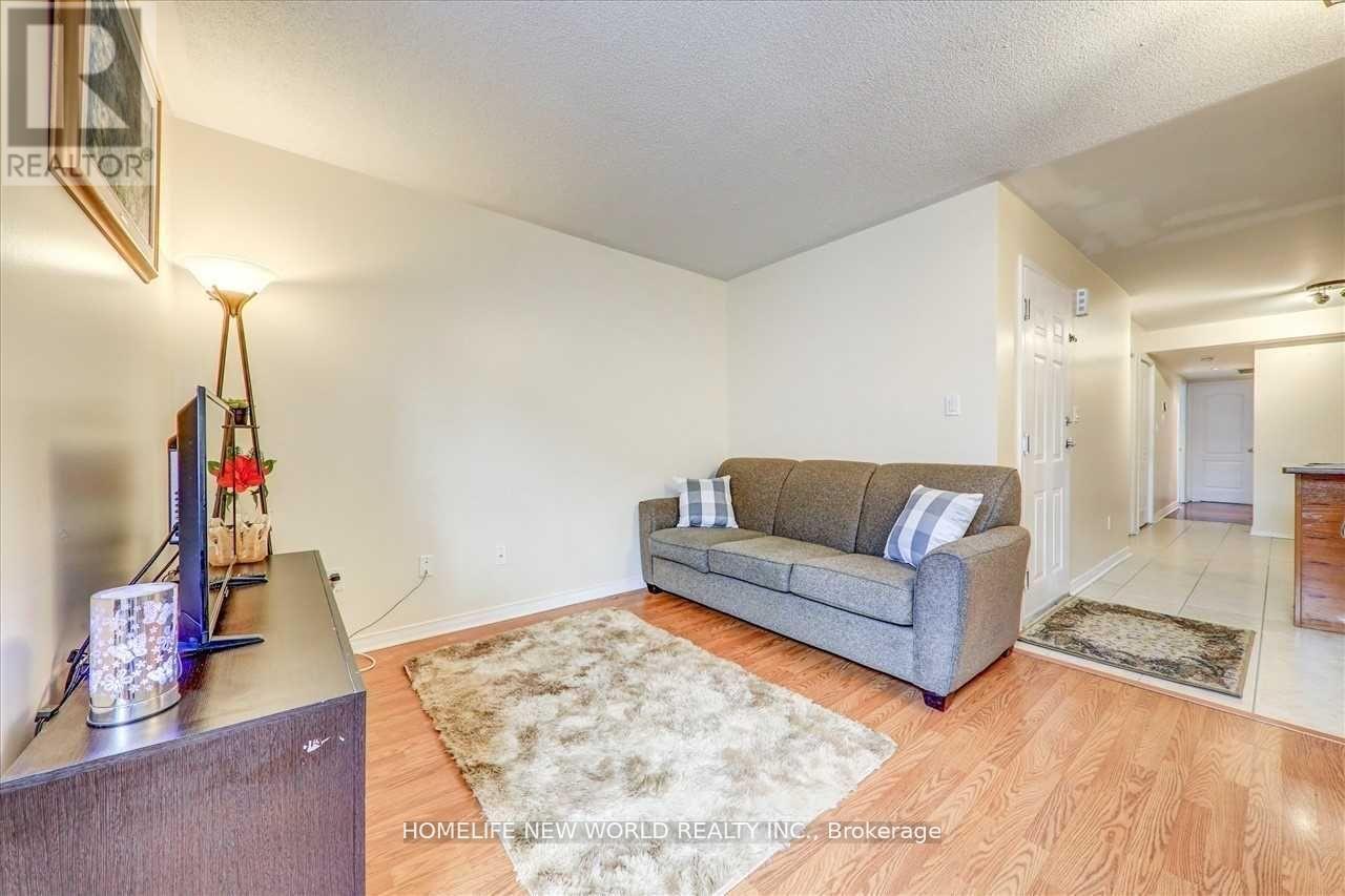 204 - 35 Strangford Lane, Toronto, ON - Indoor Photo Showing Living Room
