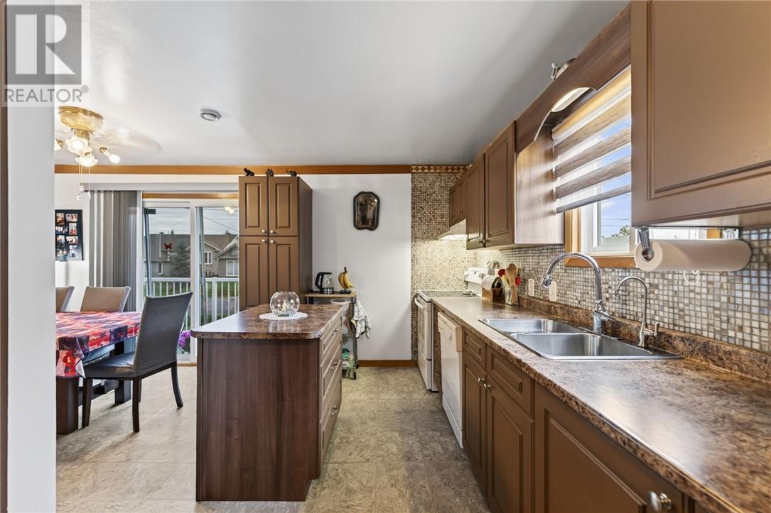 3066 River Road, Val Caron, ON - Indoor Photo Showing Kitchen With Double Sink