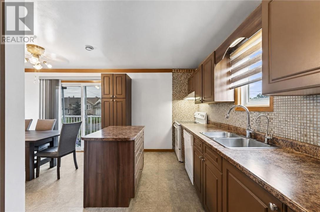 3066 River Road, Val Caron, ON - Indoor Photo Showing Kitchen With Double Sink