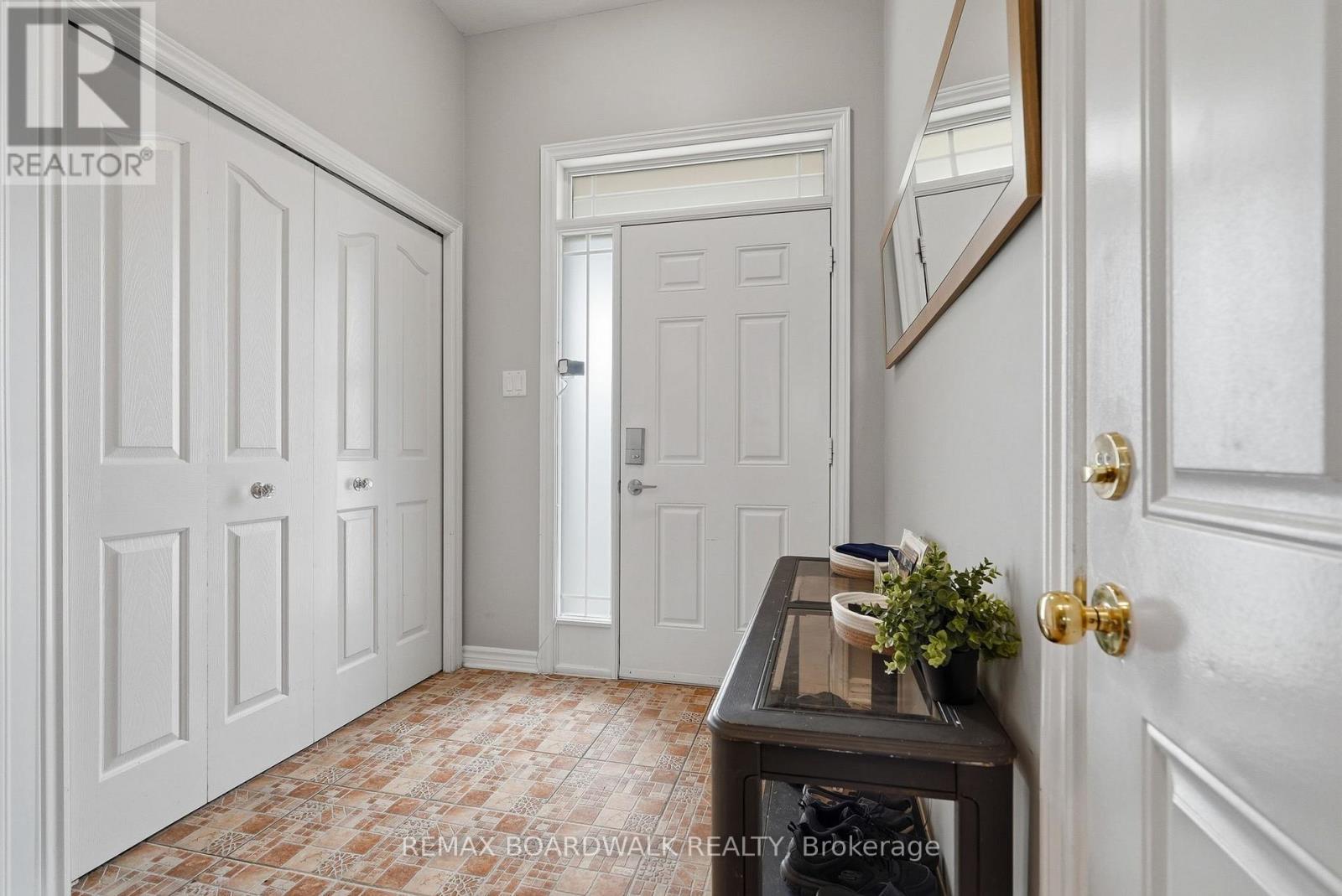 Large foyer with tall ceilings - 617 Spikemoss Place, Ottawa, ON - Indoor Photo Showing Other Room