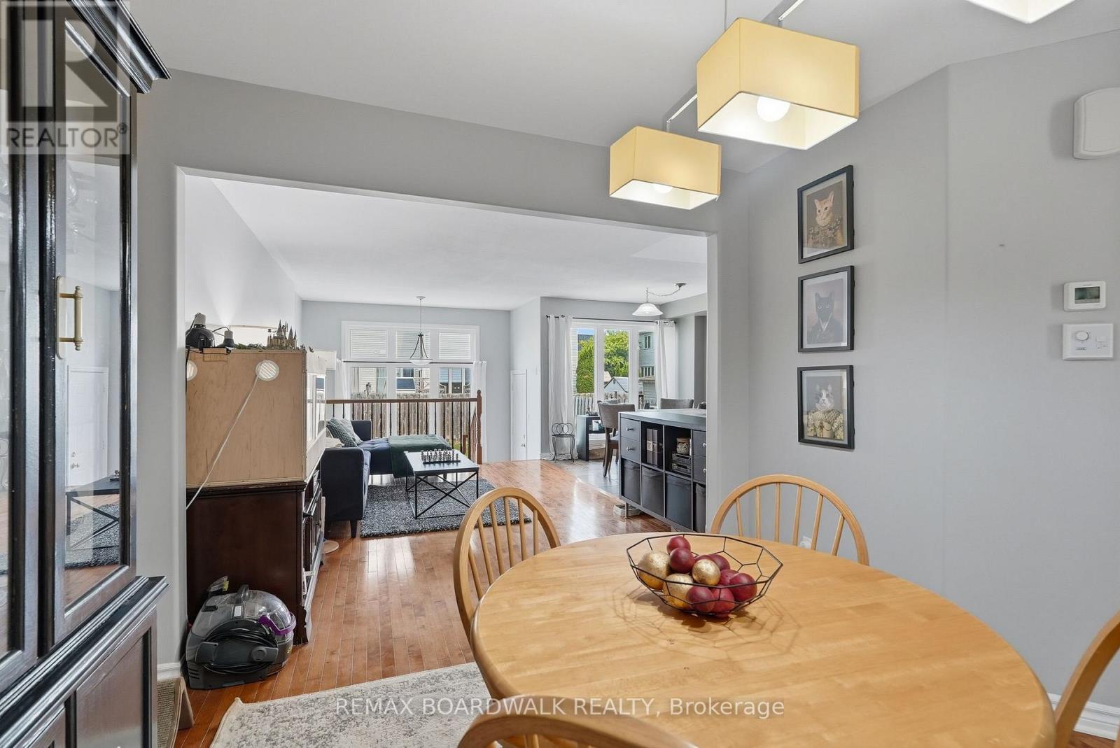 Opens to the living room... - 617 Spikemoss Place, Ottawa, ON - Indoor Photo Showing Dining Room