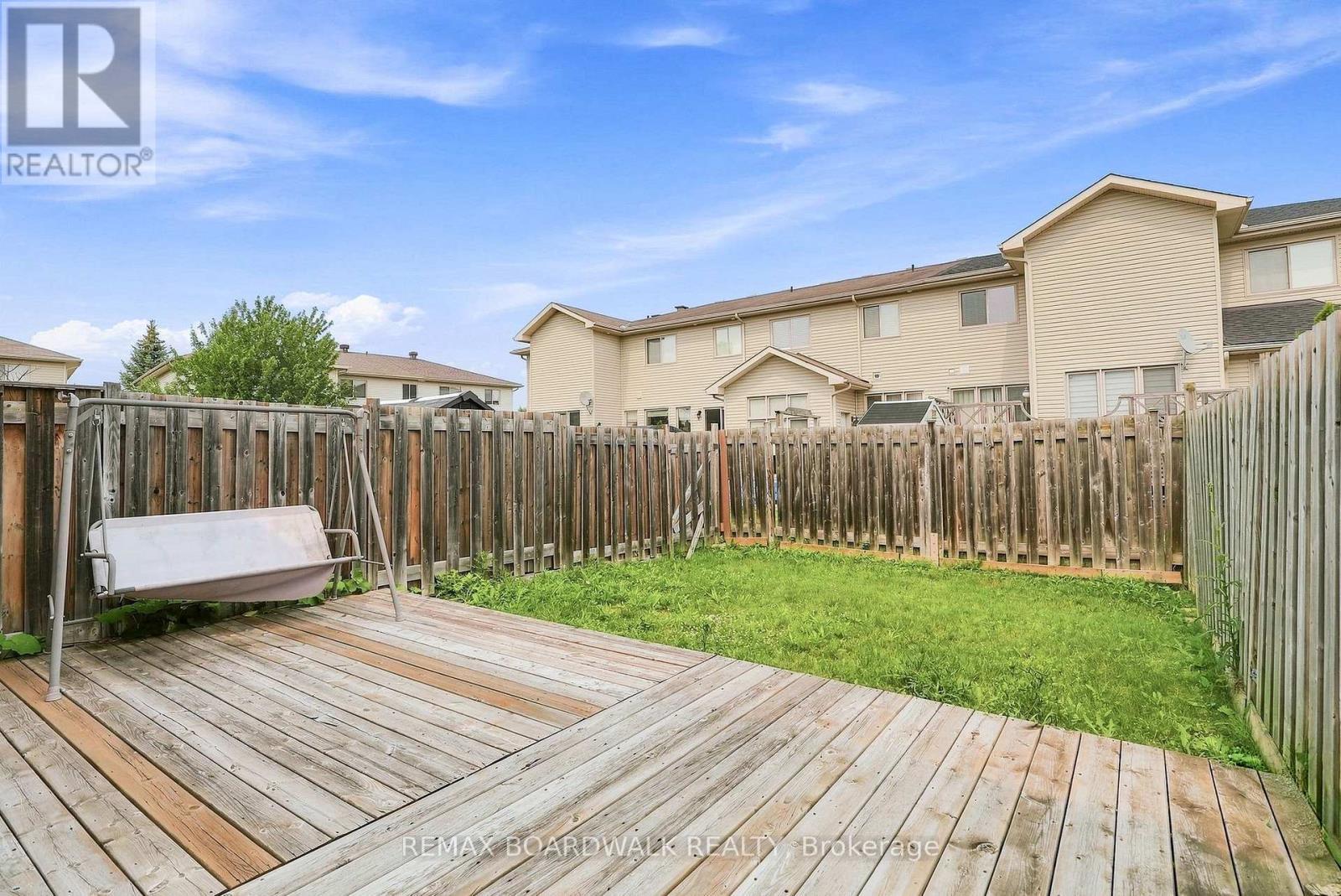 Fully fenced backyard! - 617 Spikemoss Place, Ottawa, ON - Outdoor With Deck Patio Veranda With Exterior