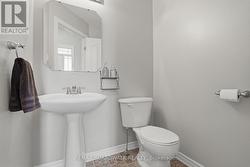 Handy powder room at main entrance -