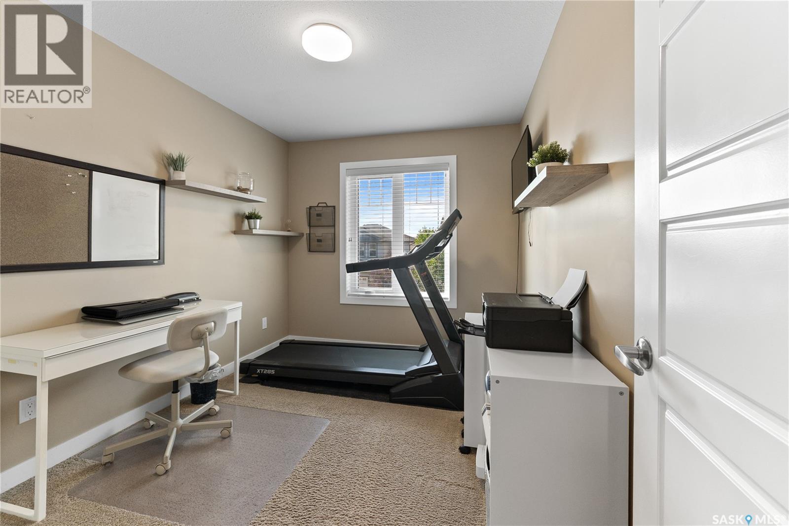 4538 Green Rock Road E, Regina, SK - Indoor Photo Showing Gym Room