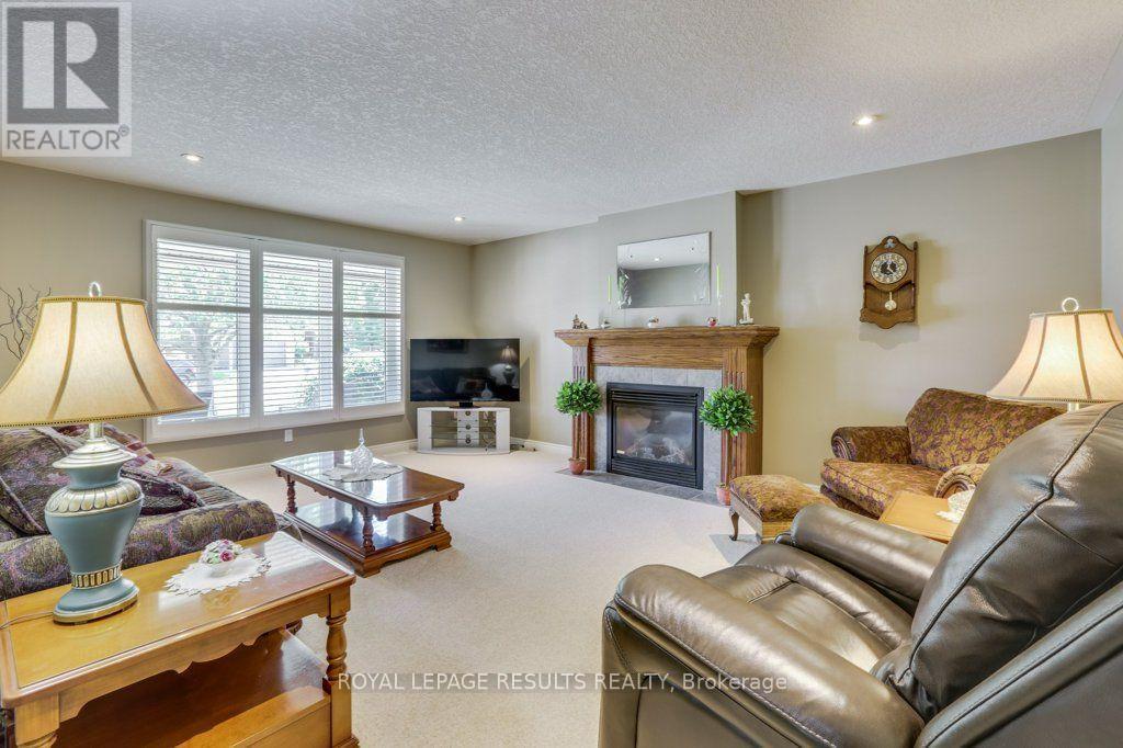 126 Glendale Drive, Tillsonburg, ON - Indoor Photo Showing Living Room With Fireplace