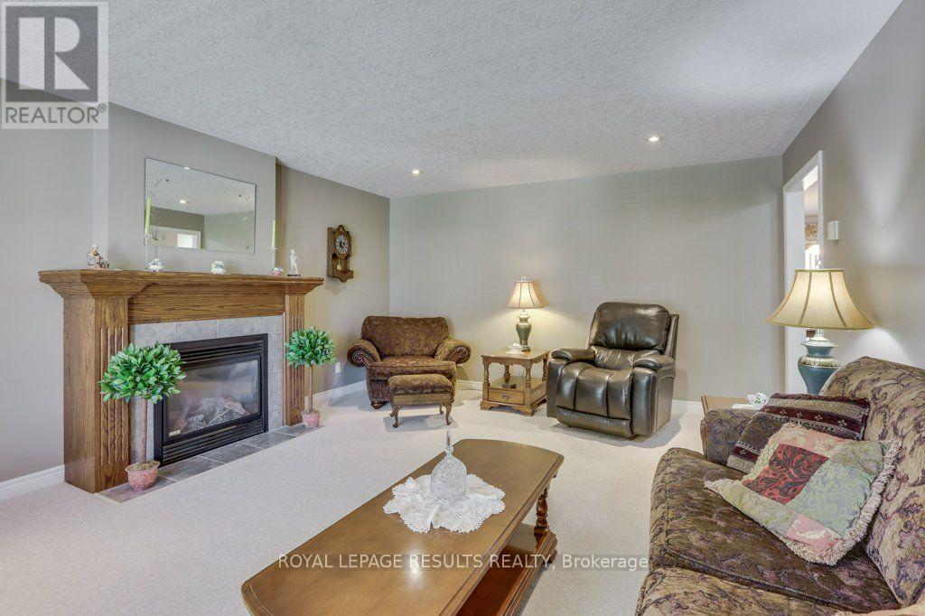 126 Glendale Drive, Tillsonburg, ON - Indoor Photo Showing Living Room With Fireplace