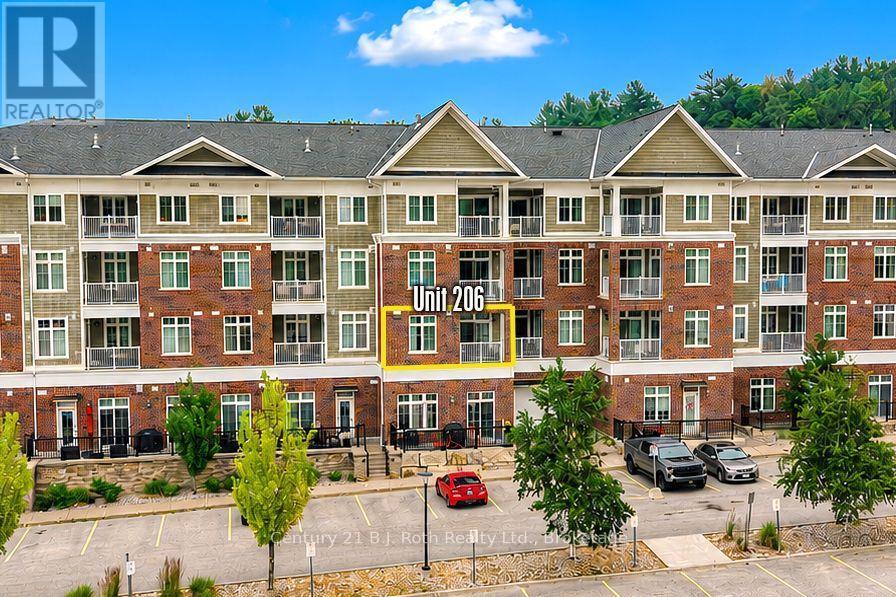 Unit 206 with fabulous views - Suite 206 - 40 Horseshoe Boulevard, Oro-Medonte (Horseshoe Valley), ON - Outdoor With Balcony With Facade
