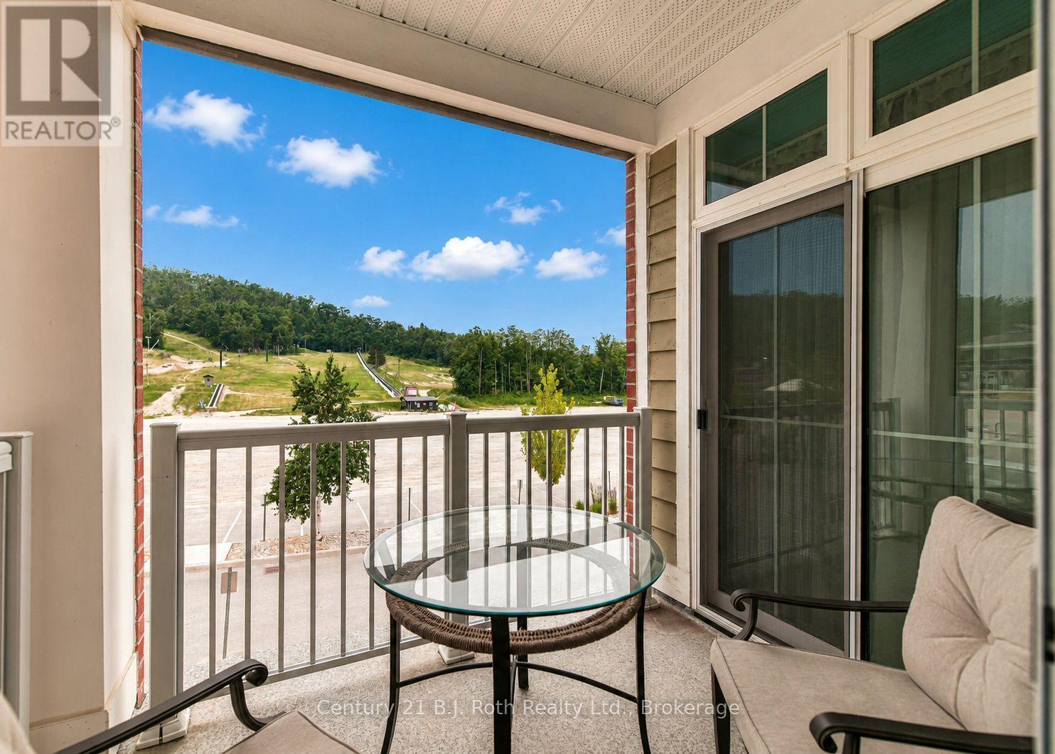 Balcony with 2 entrances - Suite 206 - 40 Horseshoe Boulevard, Oro-Medonte (Horseshoe Valley), ON - Outdoor With Balcony With Exterior