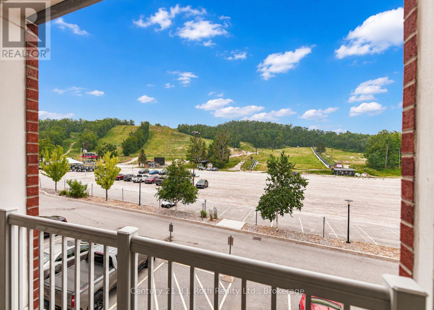 Oh my what a view! - Suite 206 - 40 Horseshoe Boulevard, Oro-Medonte (Horseshoe Valley), ON - Outdoor With Balcony With View