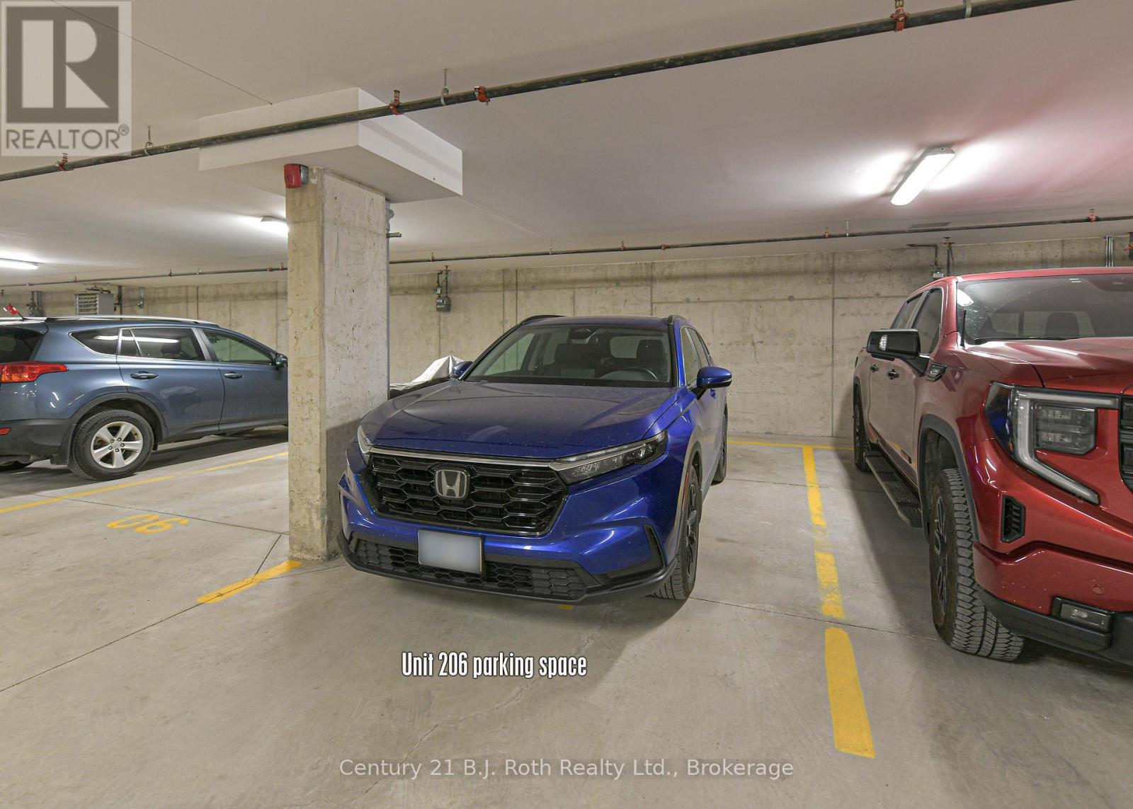 Underground parking - Suite 206 - 40 Horseshoe Boulevard, Oro-Medonte (Horseshoe Valley), ON - Indoor Photo Showing Garage