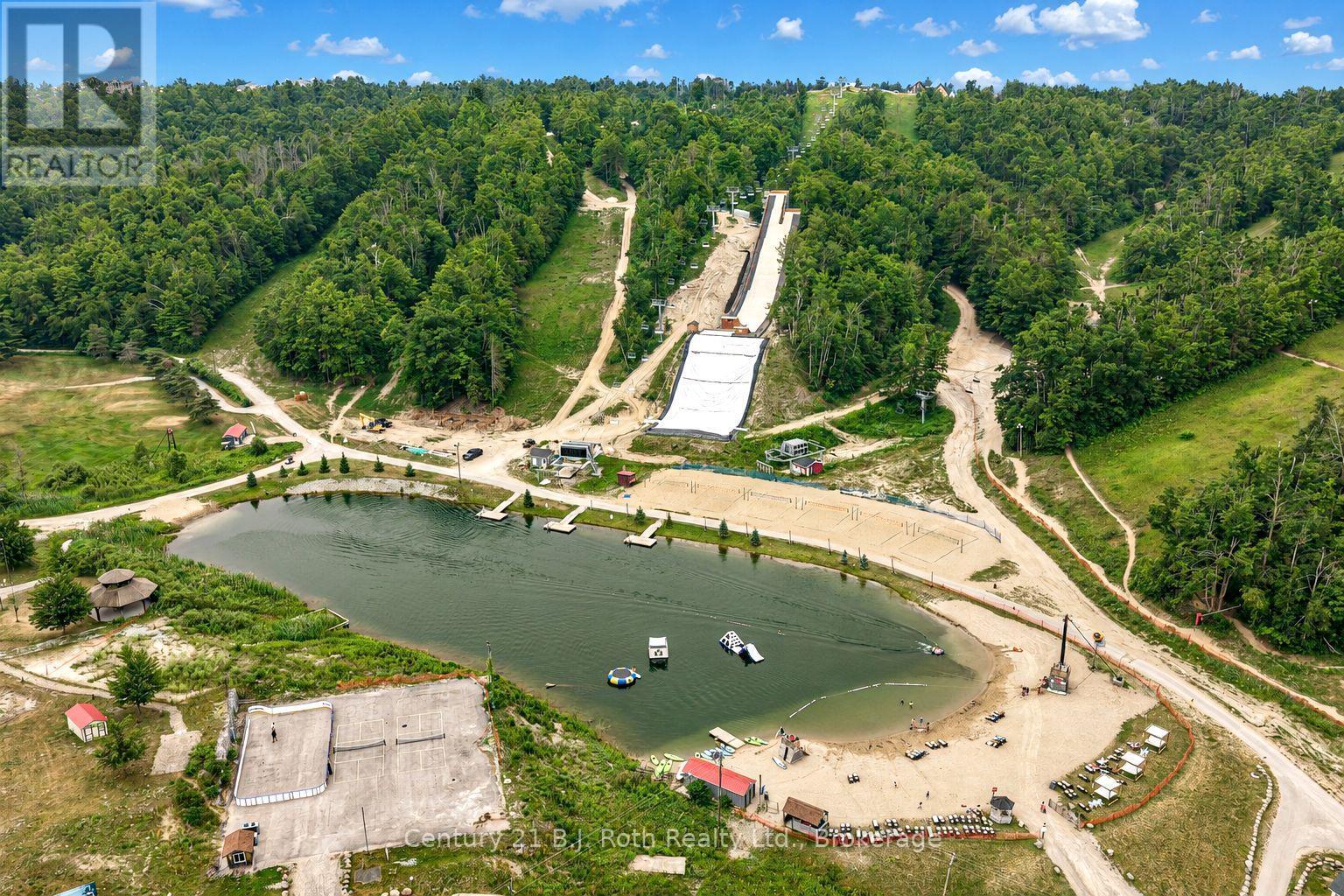 Four seasons fun! - Suite 206 - 40 Horseshoe Boulevard, Oro-Medonte (Horseshoe Valley), ON - Outdoor With Body Of Water With View