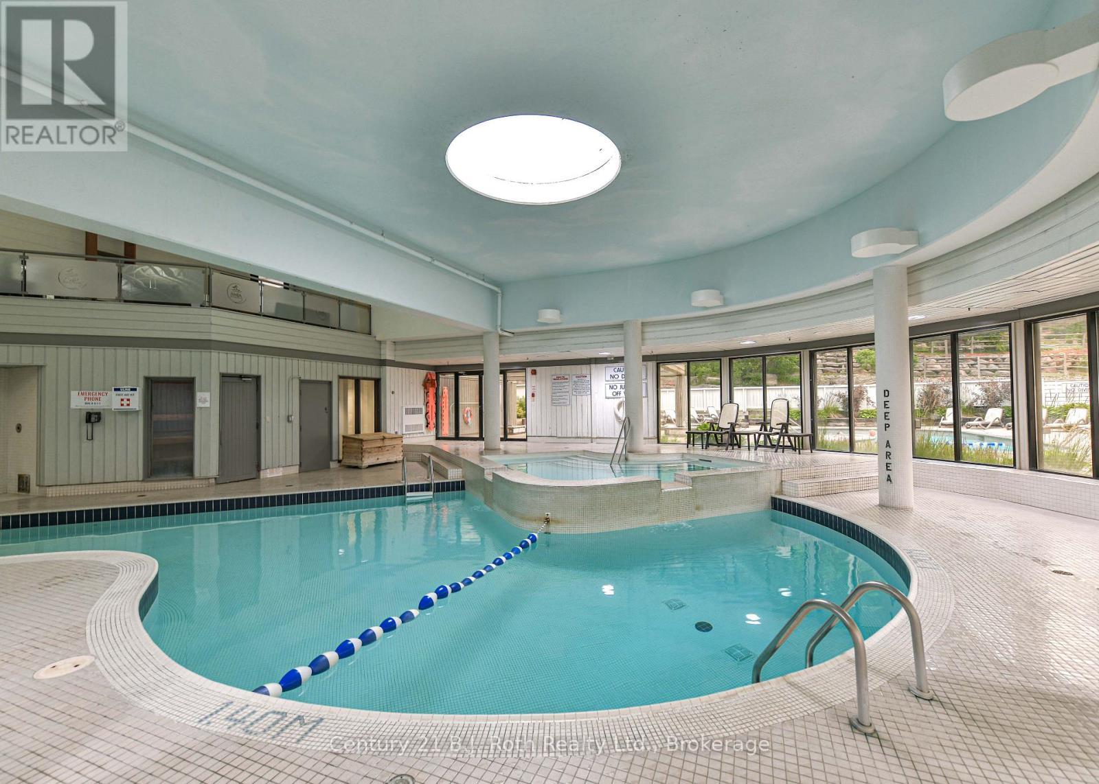 Suite 206 - 40 Horseshoe Boulevard, Oro-Medonte (Horseshoe Valley), ON - Indoor Photo Showing Other Room With In Ground Pool