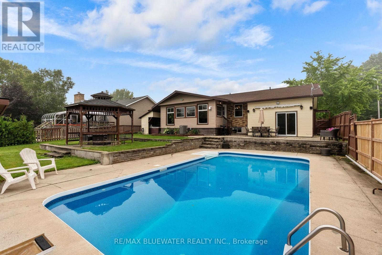 210 Hill Street, Central Huron (Clinton), ON - Outdoor With In Ground Pool With Backyard